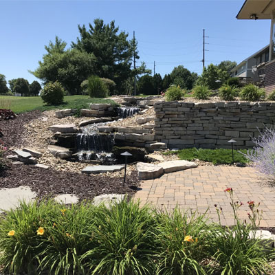 Water feature in custom landscape design.