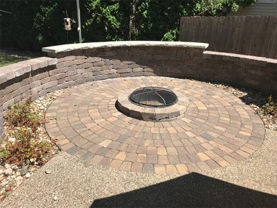 A custom patio design with inlaid stone